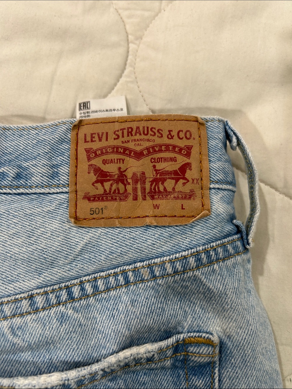 Levi's Light Wash Rolled Cutoff Denim Shorts - Picture 8 of 11